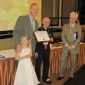 little-miss-boettger-assists-dad-at-awards-ceremony thumbnail