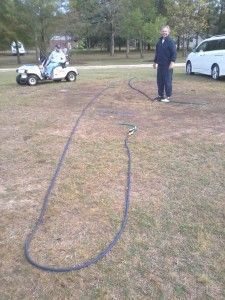 Two identical hoses, one pressurized with water, and one not 